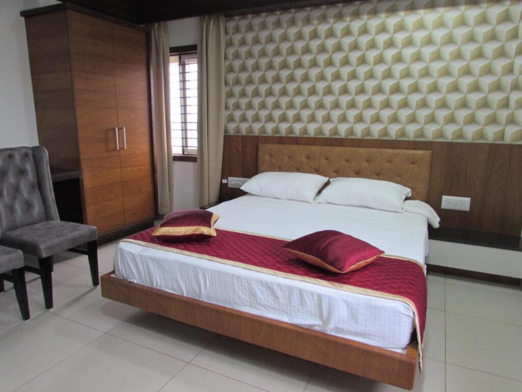 ホテル Udupi Regency ハッサン エクステリア 写真